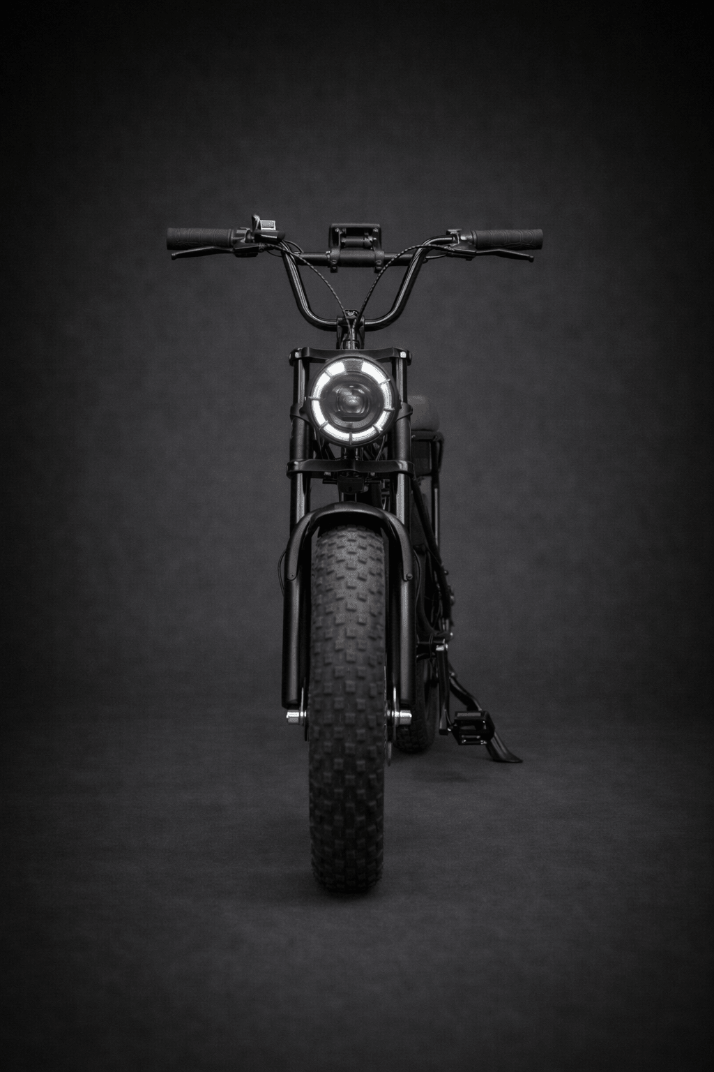 VOLTREX ARC step-through electric bike with fat tires and lightweight aluminum frame parked outdoors