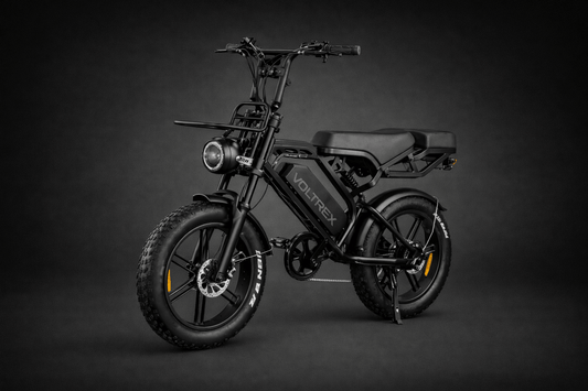 VOLTREX GRID electric bike with dual suspension, fat off-road tires, and front basket for practical everyday riding and commuting