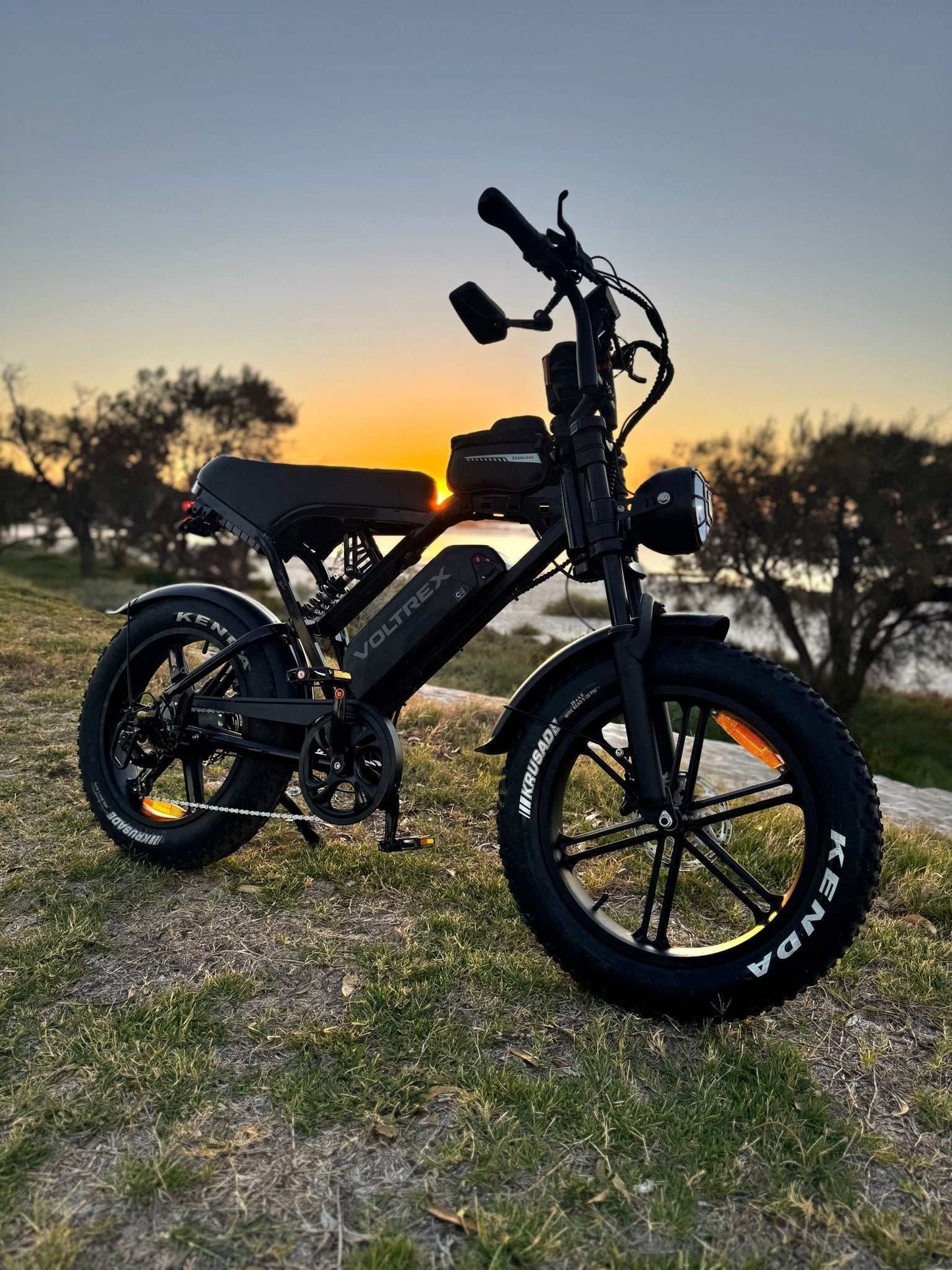 VOLTREX GRID electric bike with dual suspension and 20x4 off-road tires for versatile commuting and mixed terrain riding