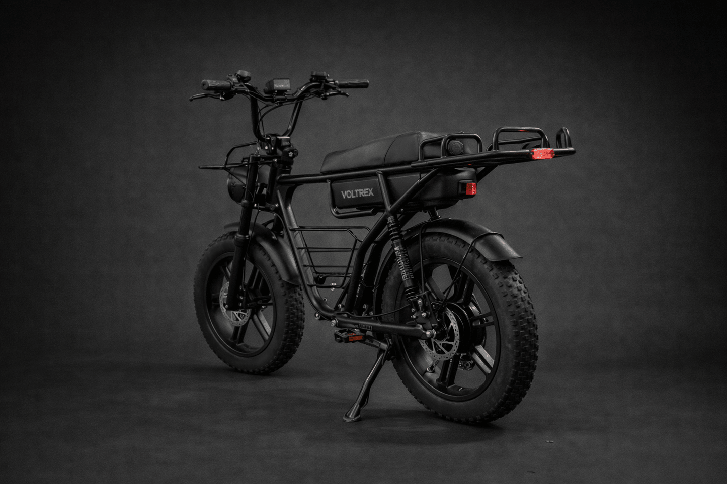 VOLTREX TORQ 1000 fat tyre electric bike with 1000W motor, dual suspension, hydraulic brakes, LCD headlight, and rear basket for commuting and off-road use